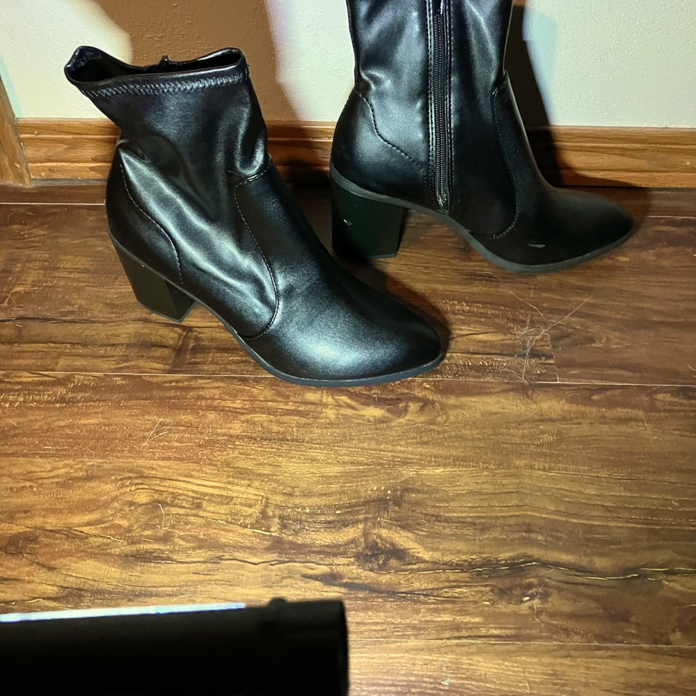 Black synthetic leather ankle boots